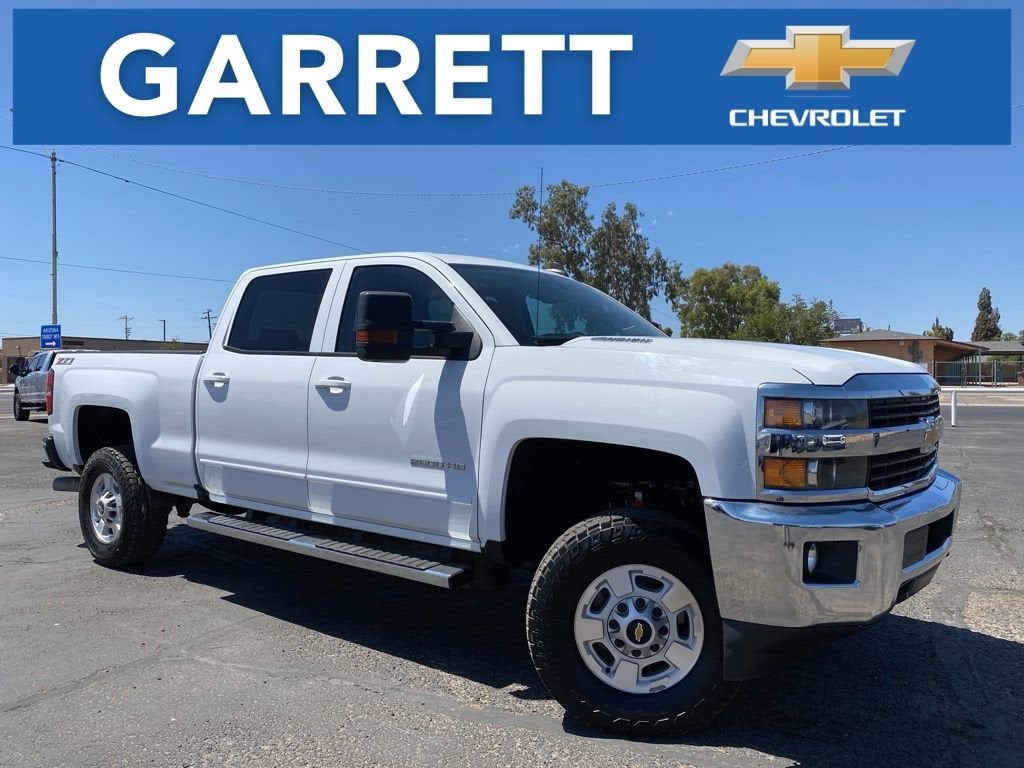 2016 Chevrolet Silverado 2500 HD LT in Summit White — front three-quarter view