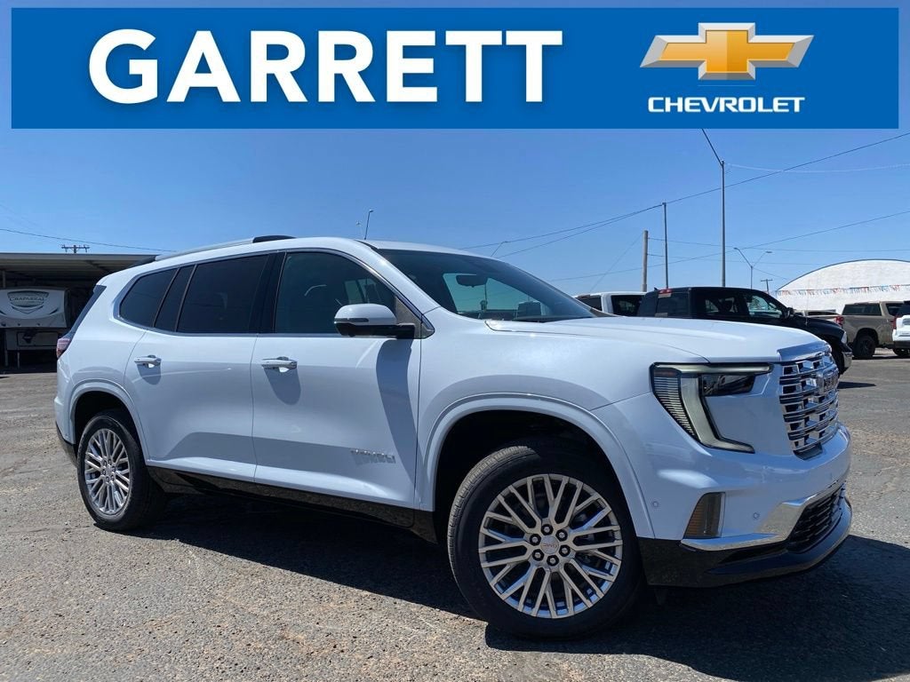 2026 GMC Acadia Denali in Glacier White Tricoat — front three-quarter view
