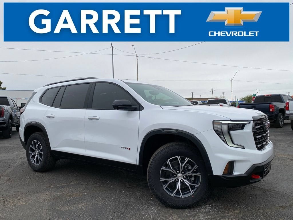 2026 GMC Acadia AT4 in Summit White — front three-quarter view