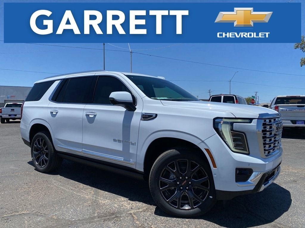 2026 GMC Yukon Denali in Glacier White Tricoat — front three-quarter view