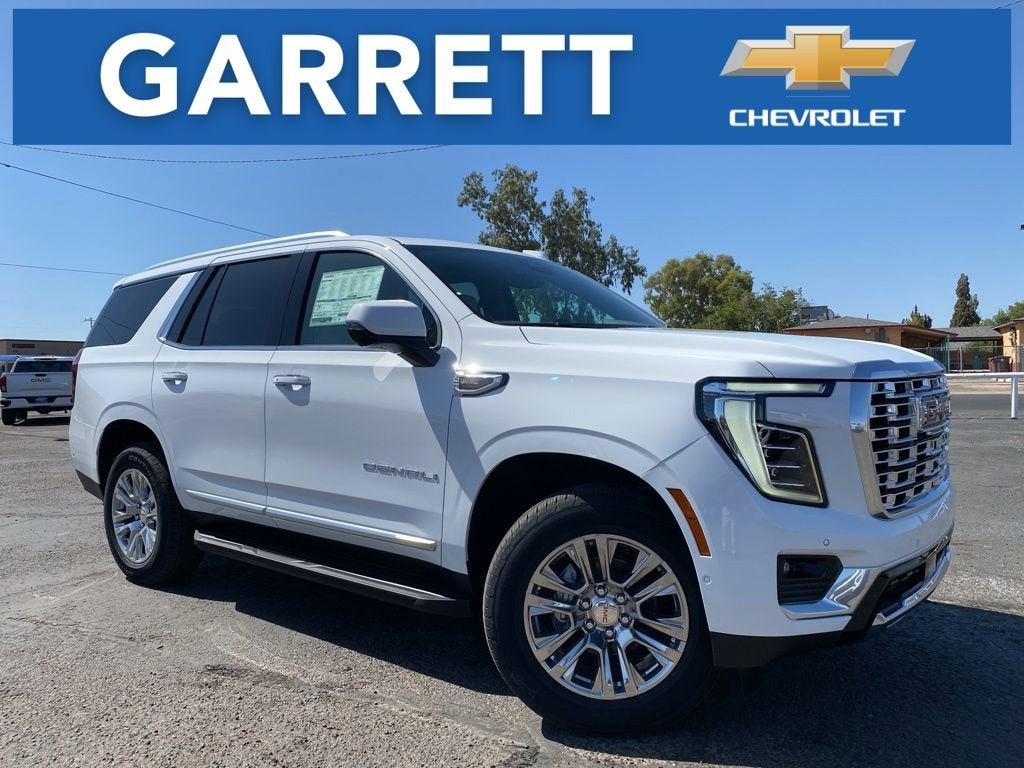 2026 GMC Yukon Denali in Summit White — front three-quarter view