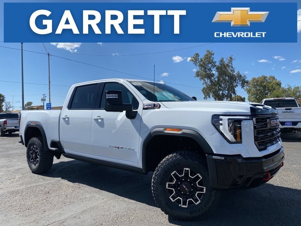 2026 GMC Sierra 2500 HD AT4X in Summit White — front three-quarter view