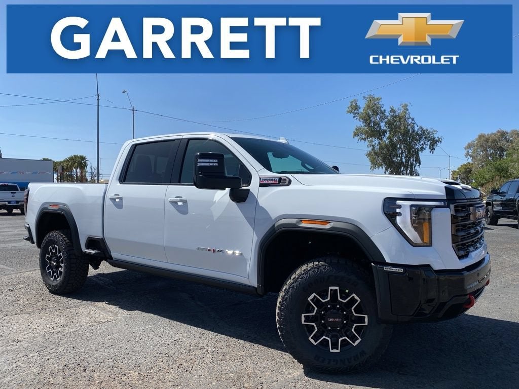 2026 GMC Sierra 2500 HD AT4X in Summit White — front three-quarter view