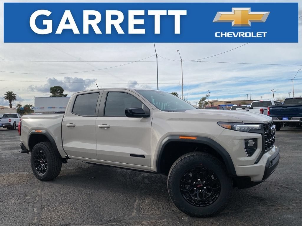 2026 GMC Canyon Elevation in Coastal Dune — front three-quarter view