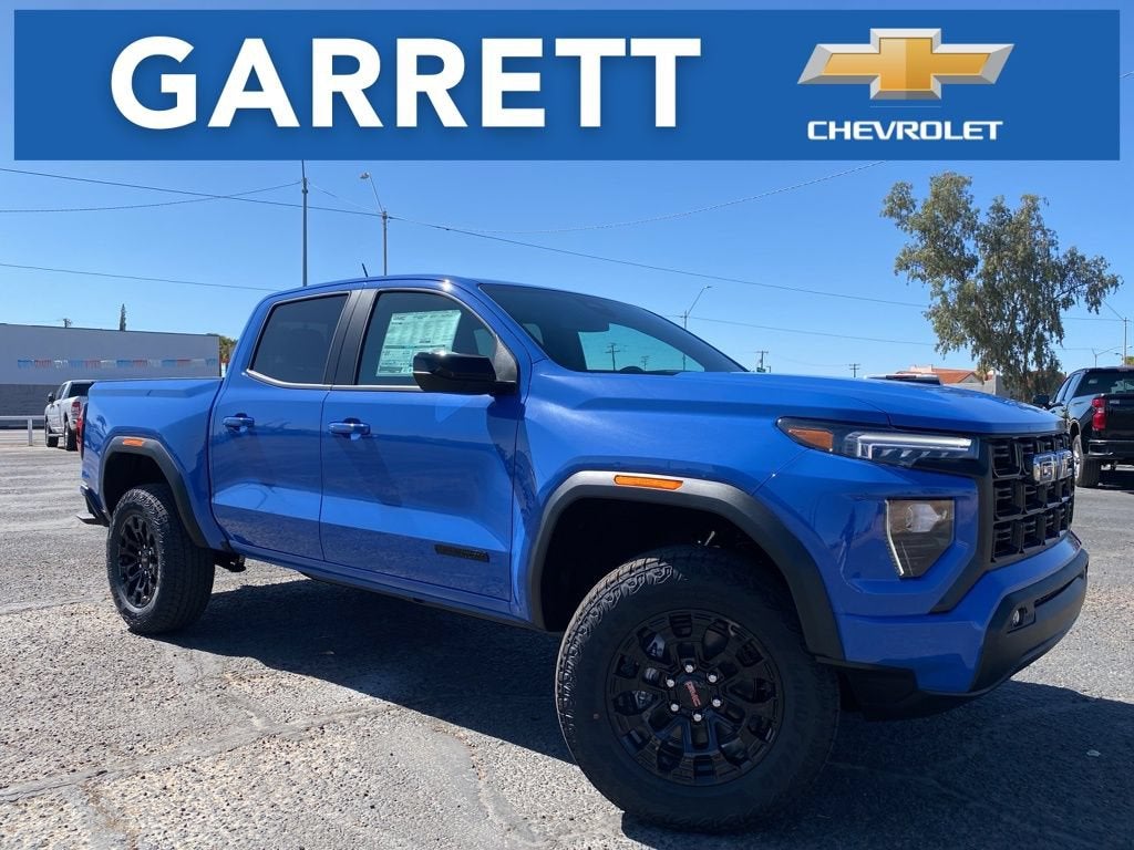 2026 GMC Canyon Elevation in Rapids Metallic — front three-quarter view