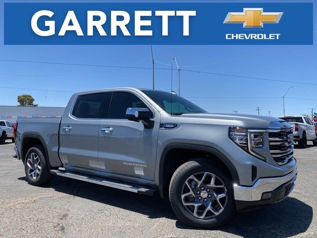 2026 GMC Sierra 1500 SLT in Sterling Metallic — front three-quarter view