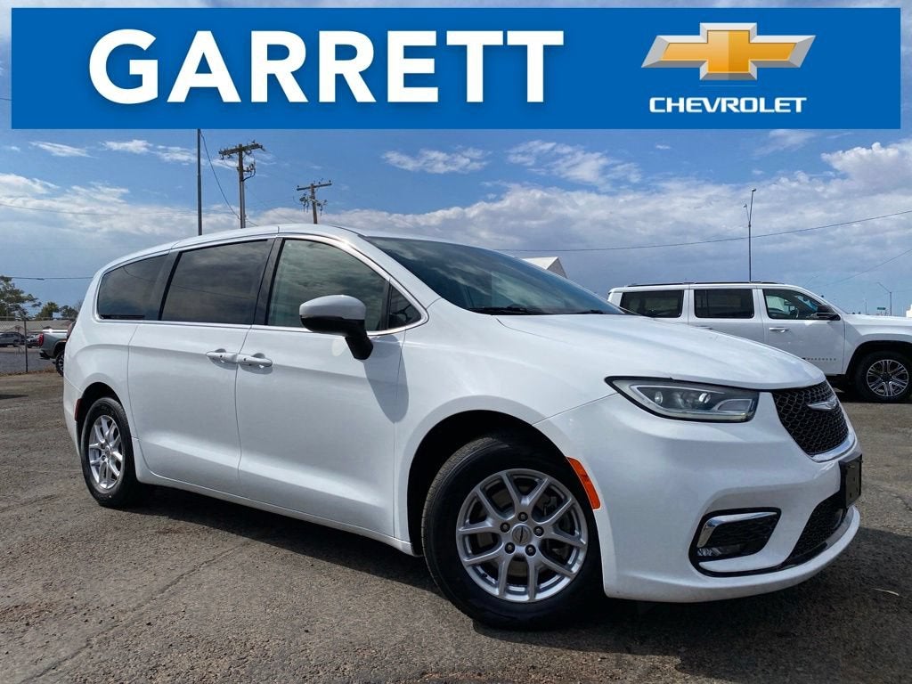 2023 Chrysler Pacifica Touring L in White — front three-quarter view
