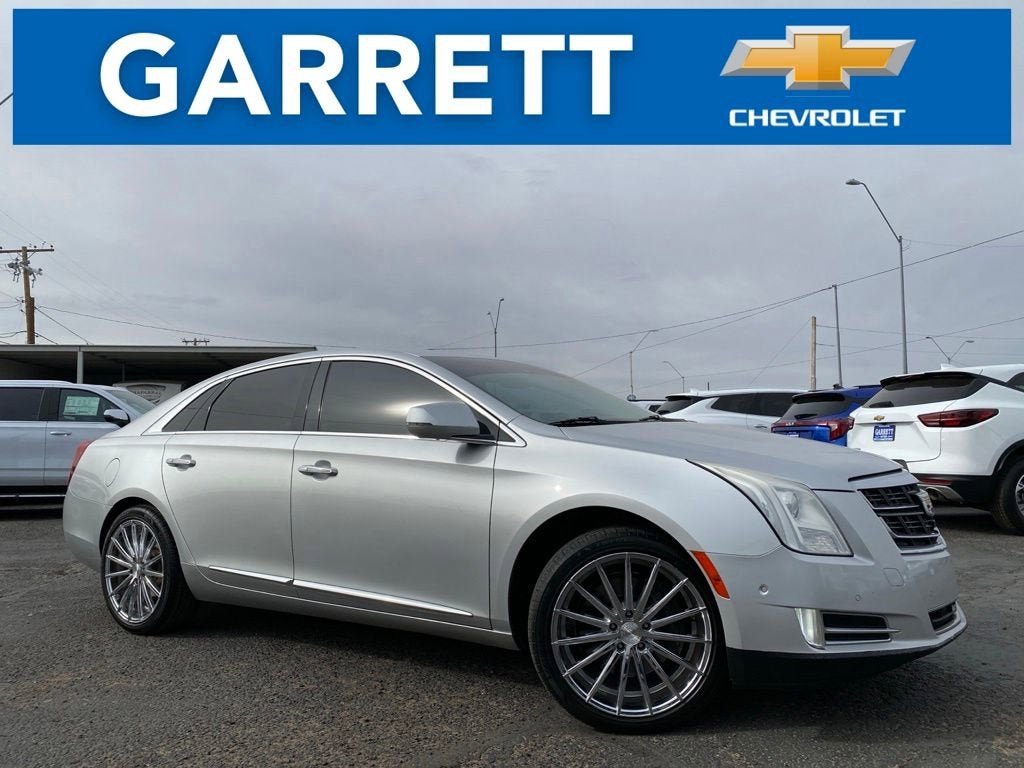 2016 Cadillac XTS Premium Collection in Radiant Silver Metallic — front three-quarter view