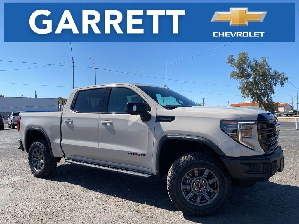 2026 GMC Sierra 1500 AT4X in Coastal Dune — front three-quarter view
