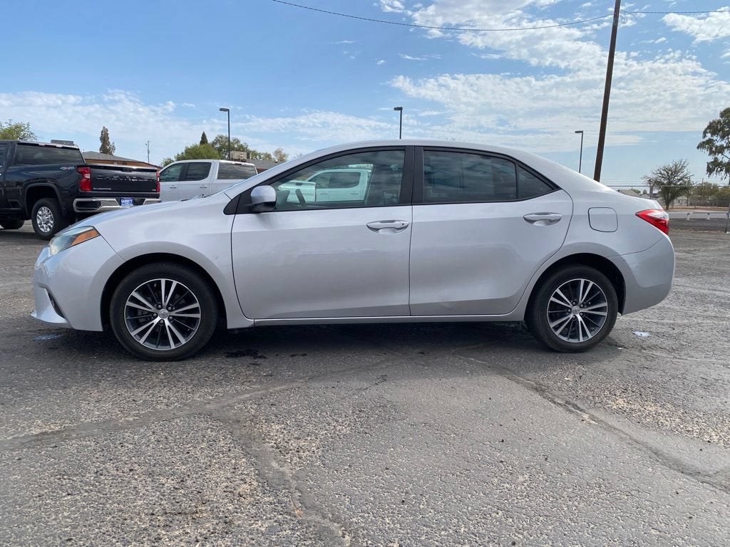 2016 Toyota Corolla — rear three-quarter view